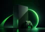 Console de jeu stylisée avec sphère verte lumineuse, illustration du rebranding Xbox en majuscules XBOX