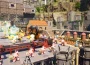 Grosse caisse à outils Palworld : Pals au travail dans une base en version 1.0