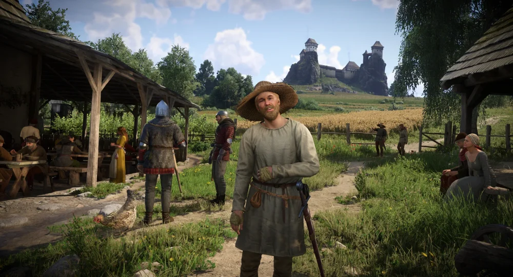 Kingdom Come Deliverance 2 astuces : Henry dans un village de Bohême au pied d'un château